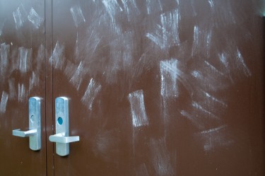 Eraser marks on door