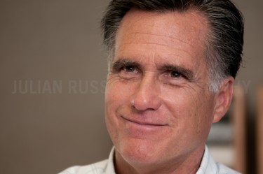 Presidential hopeful Mitt Romney speaks to potential supporters at  RSA Realty in Rochester, N.H.