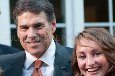Hours after announcing his candidacy presidential hopeful, Texas Governor Rick Perry speaks to supporters at the home of New Hampshire state representative Pam Tucker in Greenland, NH.