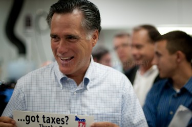Presidential hopeful Mitt Romney tours the New England Small Tube factory in Litchfield, NH.