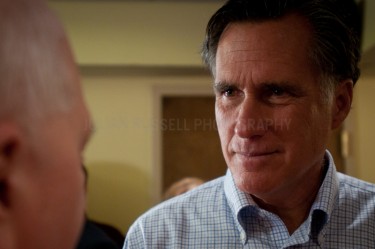 Presidential hopeful Mitt Romney speaks to potential supporters at a Town-Hall style meeting in Plymouth, NH.