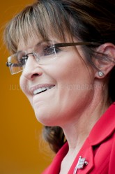 Former Alaska governor Sarah Palin addresses a crowd of Tea Party supporters at the Tea Party Express rally in Manchester, NH.
