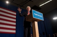 Former president Bill Clinton addresses supporters at a campaign rally for Barack Obama at UNH in Durham on Wednesday.