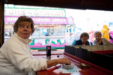 Paulette Welch keeps an eye on the board while playing Bingo Tuesday afternoon at the Rochester Fair.